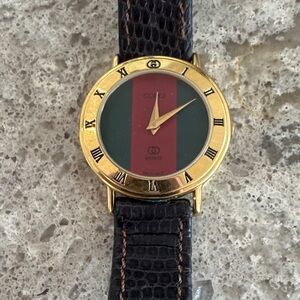 Gucci Ladies’ Gold Case Watch with Green and Red Stripe Dial